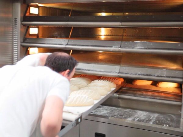 Loading Bread Into Oven